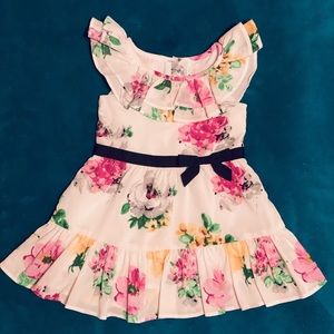 JANIE AND JACK’S BABY RUFFLE FLORAL DRESS.